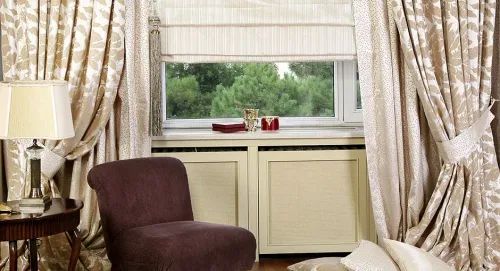 Natural Climate Control: Shade and Curtains For Energy Efficiency curtain window room family inside house indoors seat sofa chair bedroom table hotel apartment cushion