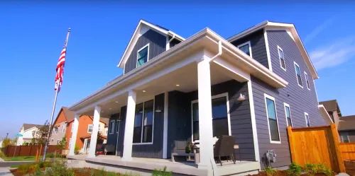 Project Profile: the Ultimate Z.E.N. Homehome architecture house family porch outdoors luxury building suburb suburban yard facade real mortgage window driveway exterior door roof