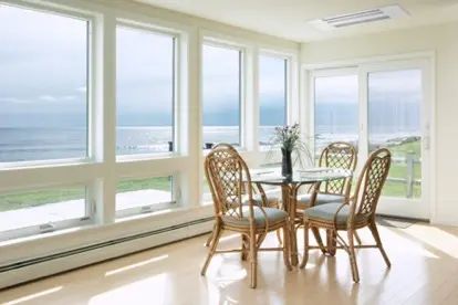 Sunroom Heating and Air Conditioning window indoors chair contemporary table luxury room inside seat sparse family absence house wood curtain architecture dining room