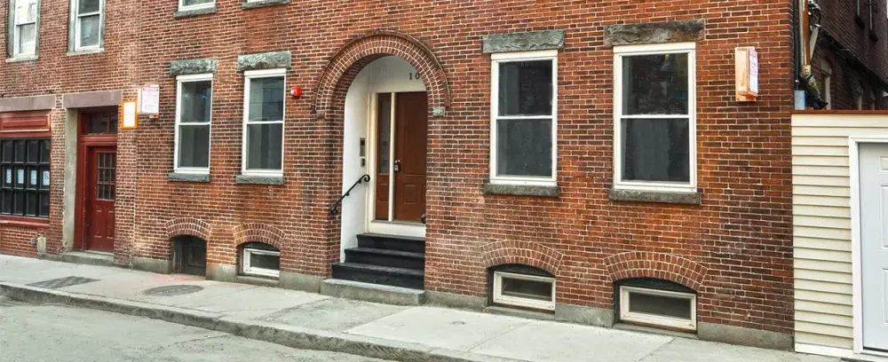North End Apartments brick house architecture building home window family door facade construction daylight pavement urban entrance exterior wall outdoors street old