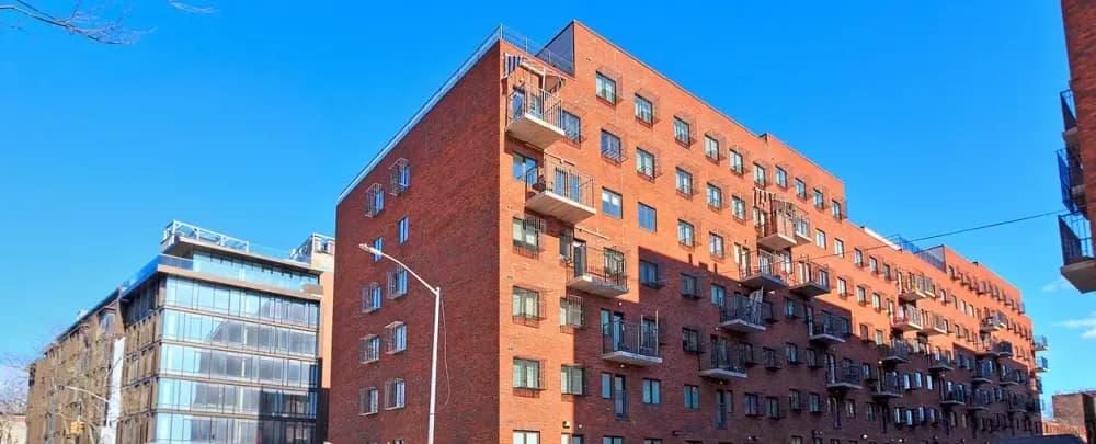 Domsey Project architecture family apartment building house window glass items city sky urban facade outdoors home flat construction brick street expression old