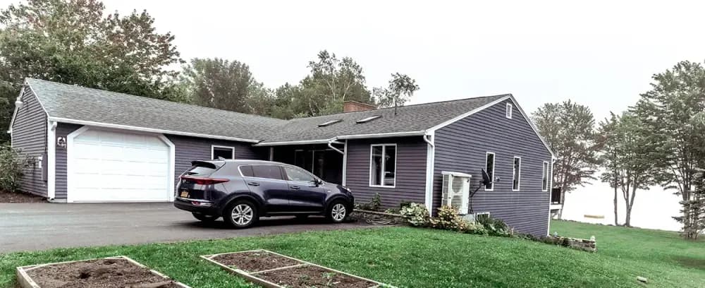 Scott Residence garage driveway home car house yard luxury front family roof blacktop classic lawn suburban property pavement door architecture tree