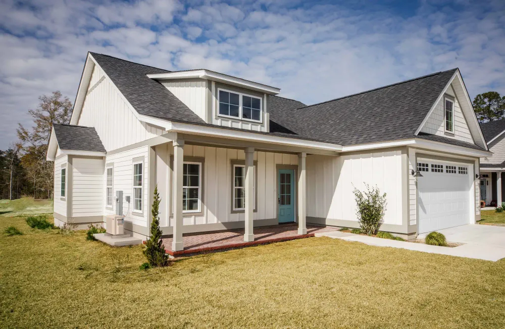 modern farmhouse exterior with mitsubishi electric heat pump