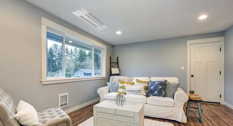 Give Your Family Personalized Comfort Year Round with Heat Pump Technology room indoors sofa contemporary family window seat house apartment home chair luxury table cushion coffee table