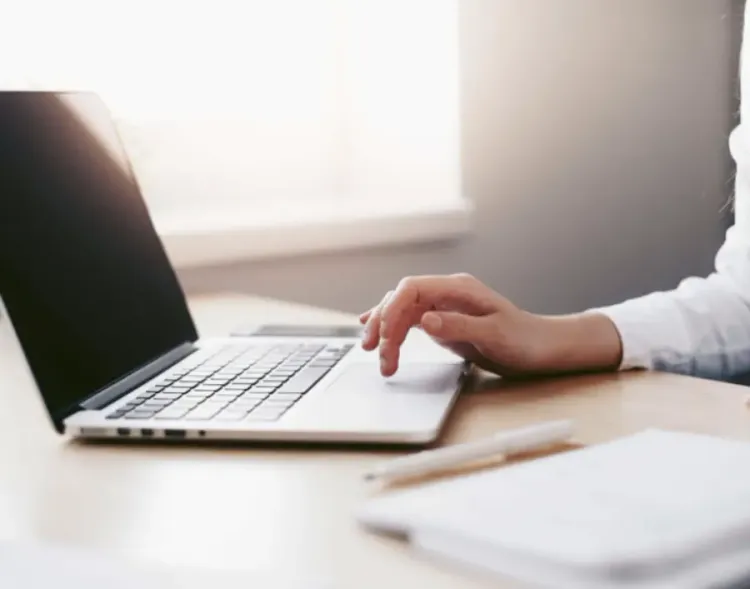 New Year, New Savingslaptop computer desk technology indoors office internet connection adult writing business woman sitting room people man paper concentration contemporary